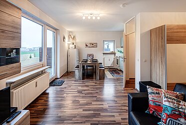 Karlsfeld: monolocale ammobiliato con ampio balcone e vista sul verde – disponibile a breve