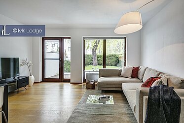 Posizione privilegiata a Harlaching: Elegante bilocale da giardino con caminetto