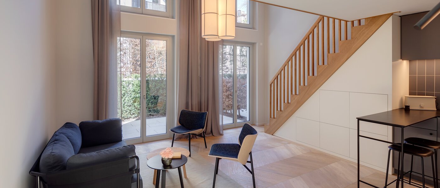 maisonnette con galleria München Herzogpark 05 zona living 12522