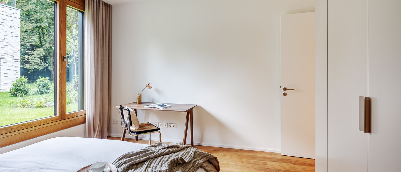 appartamento con giardino München Harlaching 04 camera da letto 13067