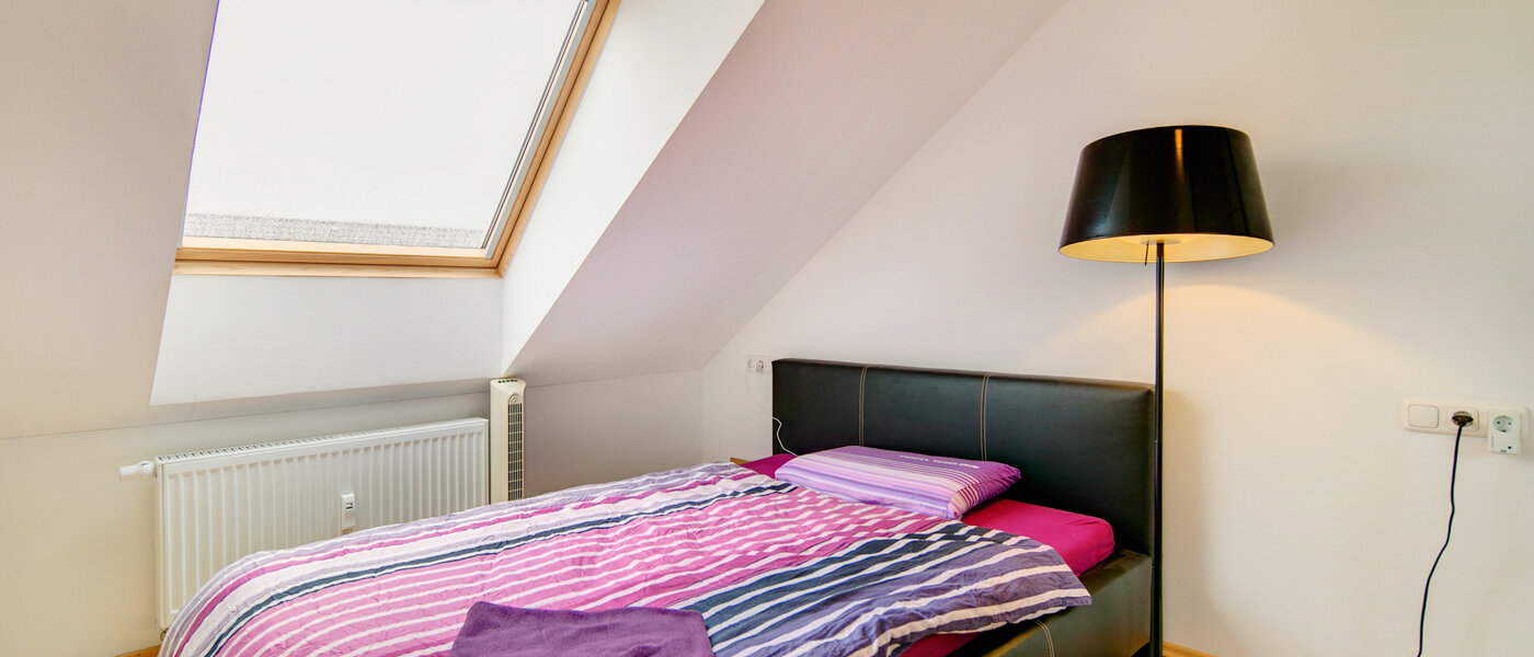 attico con terrazzo München Untermenzing 01 zona notte 7372