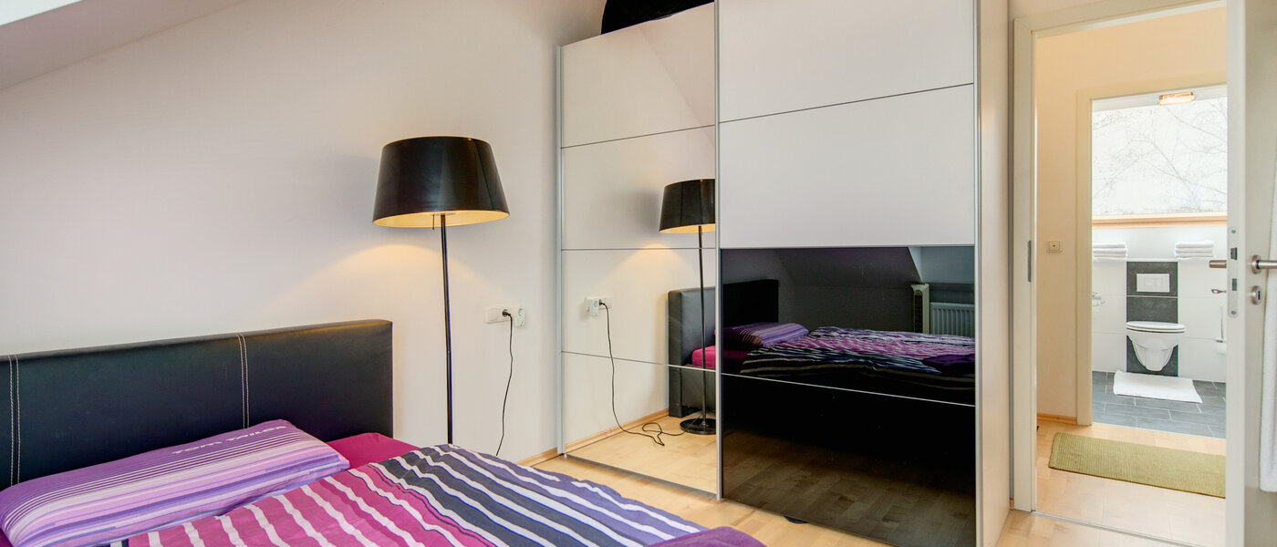 attico con terrazzo München Untermenzing 03 zona notte 7372