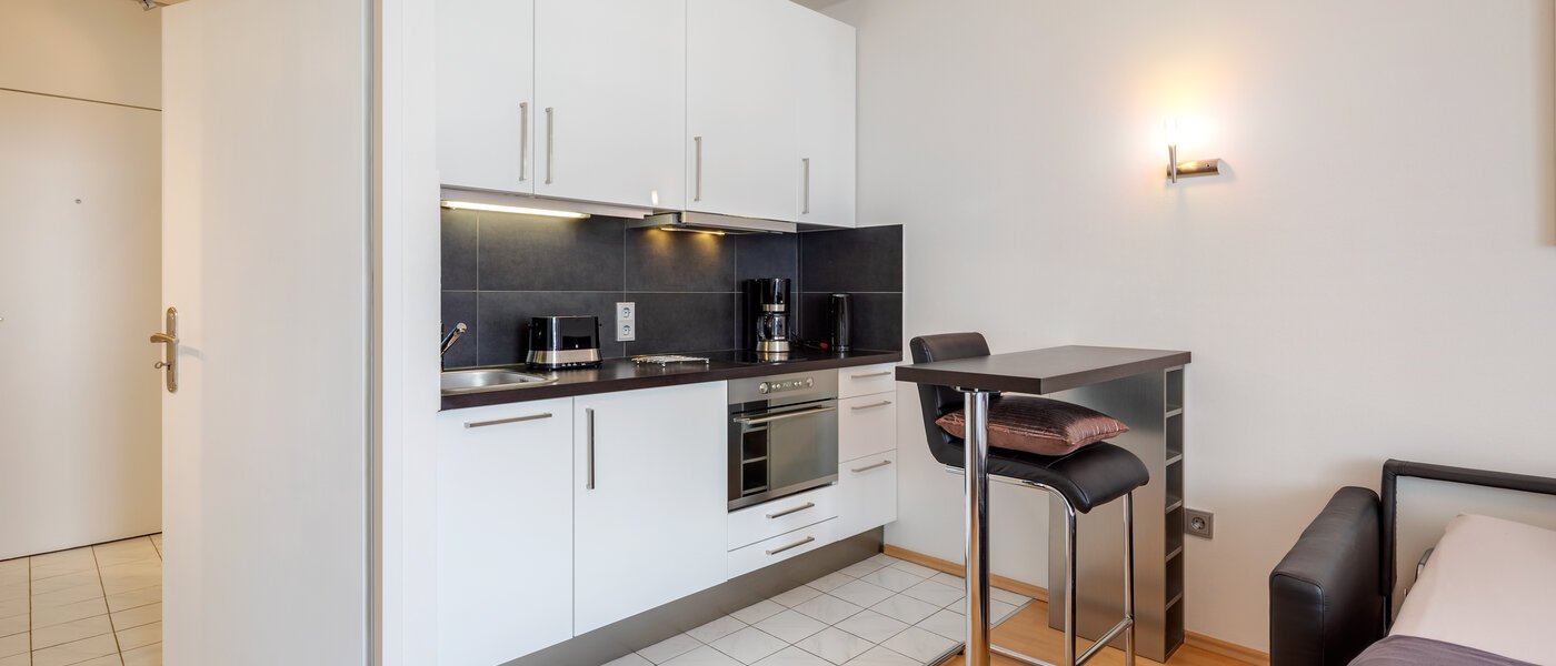 abitazione München Arabellapark 03 zona living 7848