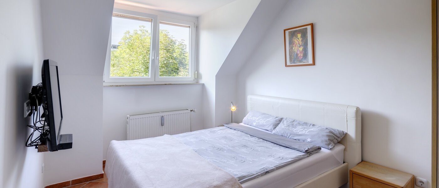 attico München Trudering 01 camera da letto 9072
