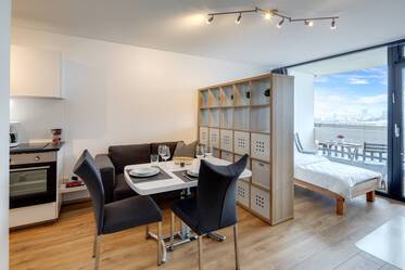 Vicino alla BMW: soggiorno temporaneo in un monolocale a Schwabing