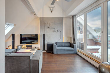 Dachgeschosswohnung mit außergewöhnlichen Lichtelementen