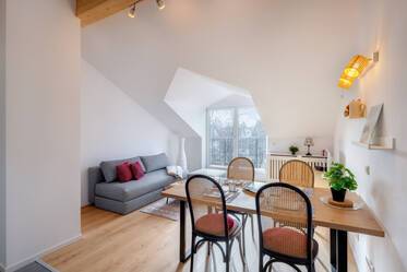 Moderno appartamento mansardato in affitto