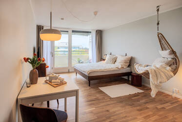 Luminoso appartamento con balcone esposto a sud-ovest, piscina e sauna