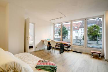Attico con terrazzo ben arredato, a Giesing