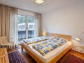 attico con terrazzo München Menterschwaige 01 camera da letto 14914