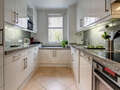 attico con terrazzo München Arabellapark 01 cucina 9024
